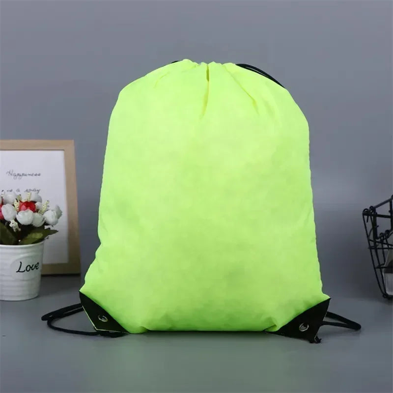 Neon lime green drawstring backpack with black trim and straps