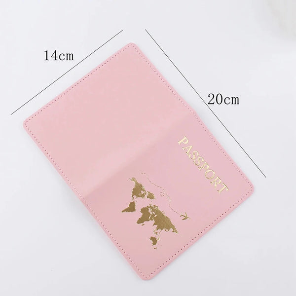 A pink elegant PU leather passport holder wallet with gold lettering and dimensions marked.