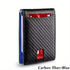 A black carbon fiber wallet with a blue lining and a red card slot.