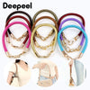 A collection of various colored PU leather replacement bag straps with metal buckles.