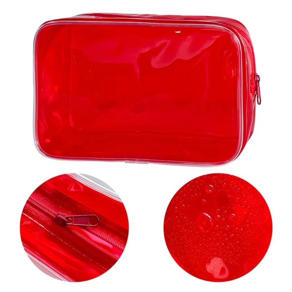 A bright red transparent PVC travel makeup bag with a zipper closure shown from the top and a close-up of the zippered openin