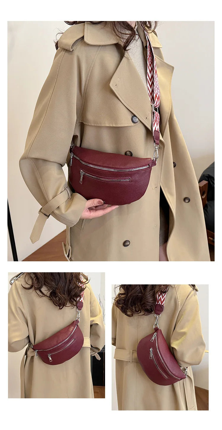 A woman models a maroon PU leather multi-pocket crossbody bag with a striped strap against a beige coat.
