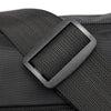 Close-up of a black nylon shoulder bag featuring a rectangular strap detail.