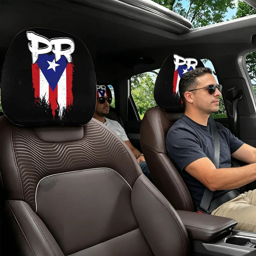 Black car interior showing leather headrest covers with a patriotic design on the seats