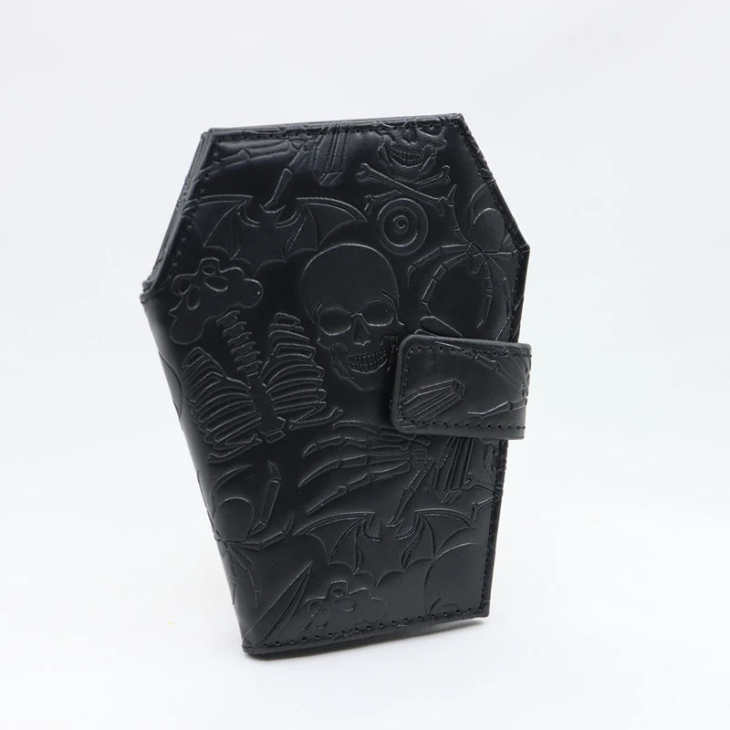 Black leather wallet featuring a vintage embossed design of a skull and foliage.