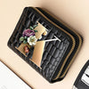 Black quilted PU leather clutch wallet with a gold accent and a cartoon print design.