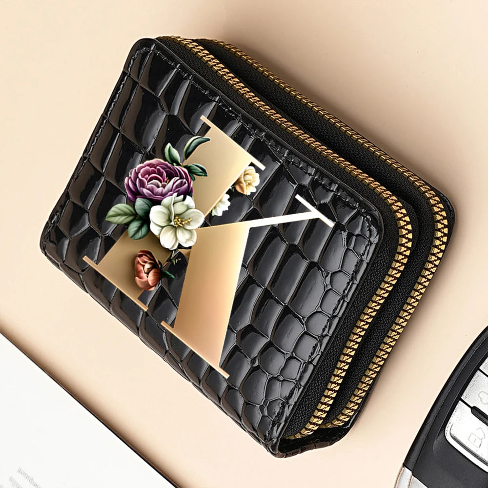 Black quilted PU leather clutch wallet with a gold accent and a cartoon print design.