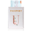 A pink leather passport holder featuring a gold initial U and a delicate floral design.