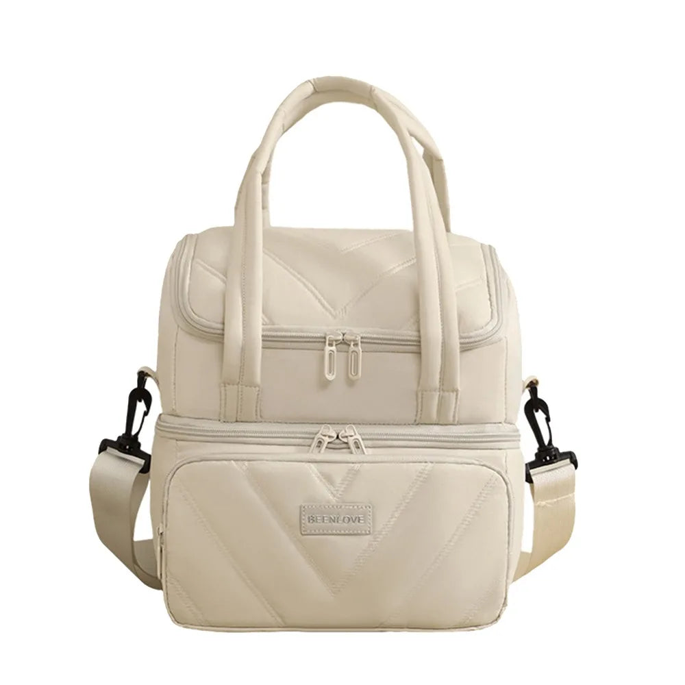 Bolsa reutilizable aislante beige con tapa acolchada y compartimentos con cremallera.