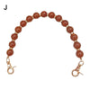 Handcrafted resin stone bead bag chain with round amber beads and gold clasps