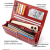 Red genuine leather clutch wallet showing various compartments including card holders, photo window, and banknote slots