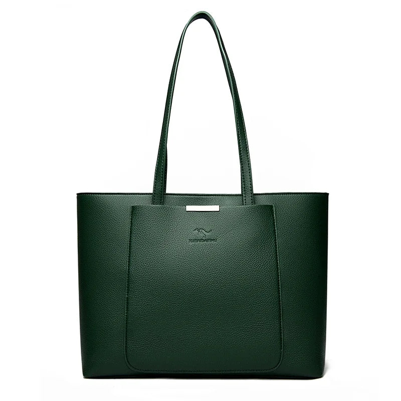 A dark green leather shoulder bag with a canvas strap shown against a white background.