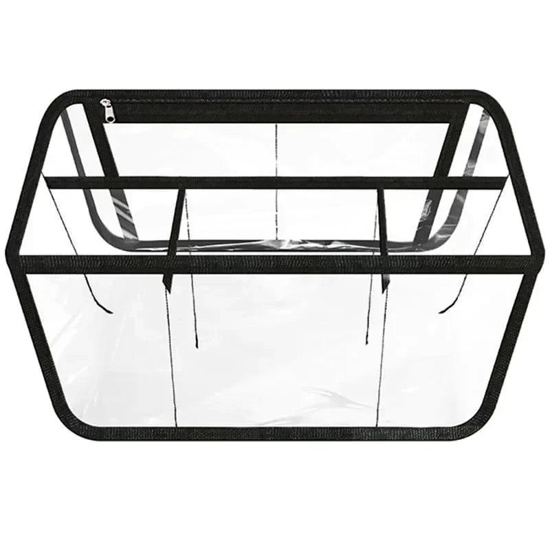 A clear waterproof beach bag organizer with dividers and a black frame.