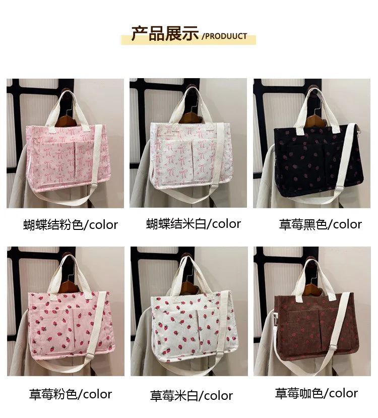 A set of canvas tote bags featuring various colors including pink, white, and black with strawberry designs.