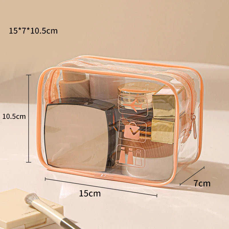 A clear plastic toiletry bag with an orange rim and a zipper, showing various cosmetic items inside.