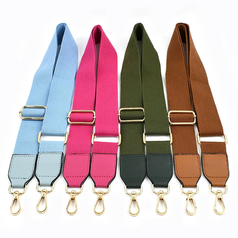Five canvas cotton bag straps in blue, pink, olive green, and brown with metal hooks