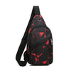 Black waterproof crossbody chest bag with red geometric pattern and black strap