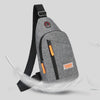 A gray lightweight oxford cloth crossbody bag with black strap and orange accents, shown against a light gray background.