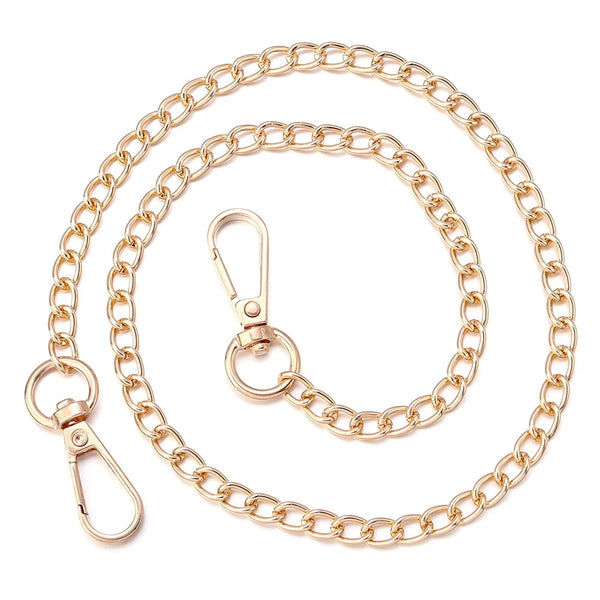 A gold-toned adjustable purse chain strap made of linked metal chains.
