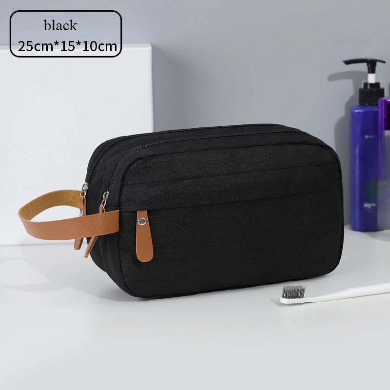 Black portable travel storage pouch measuring 25cm x 15cm x 10cm with a tan leather strap.