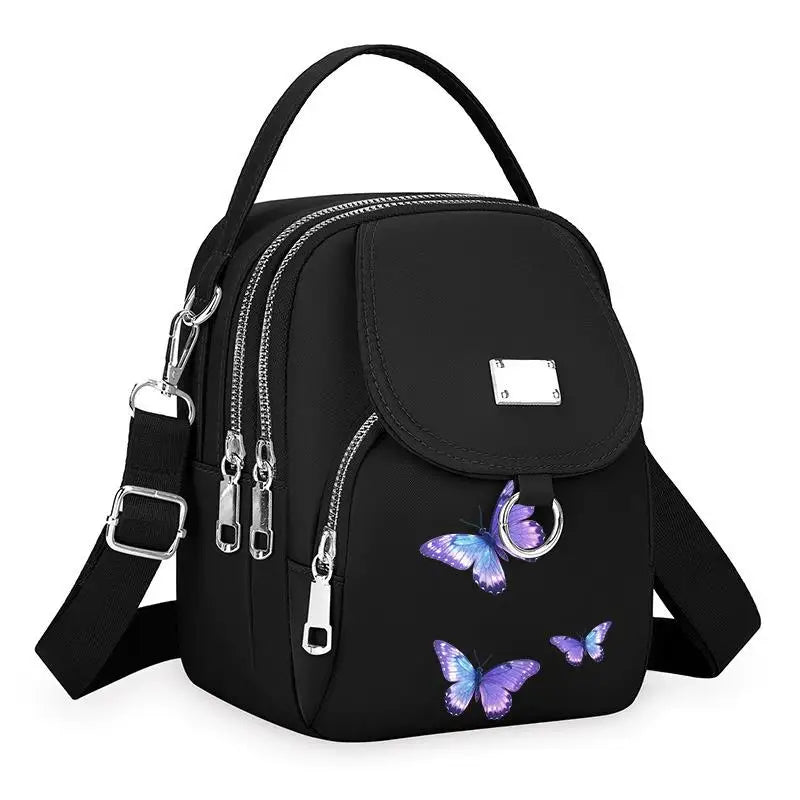 Sac à bandoulière floral noir et durable avec broderie de papillon violet