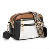 A brown and black PU leather crossbody bag with multiple zippered pockets and a patterned strap.