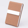 A brown woven PU leather business card holder with a white card slot.