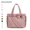 A mauve large capacity tote bag with a bow detail shown against a white background.
