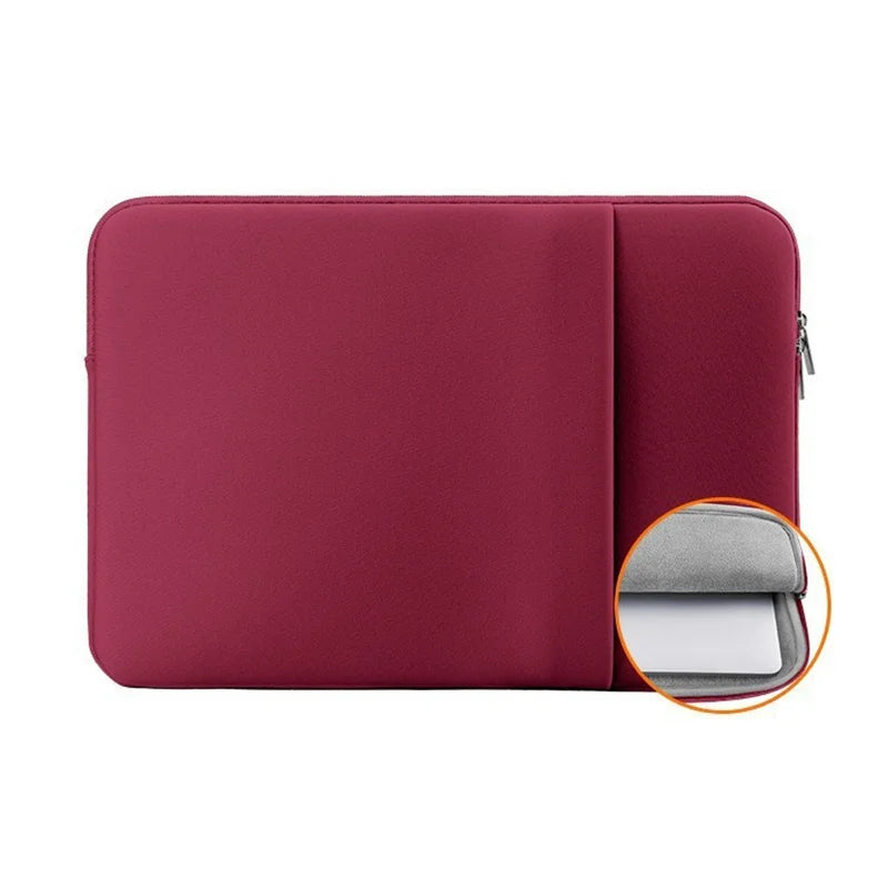 A maroon laptop sleeve case with a gray lining shown from the side.