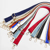 A collection of adjustable wide crossbody bag straps in various colors including blue, white, red, and black.