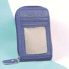 A purple leather card holder wallet with a clear window and a silver clasp.