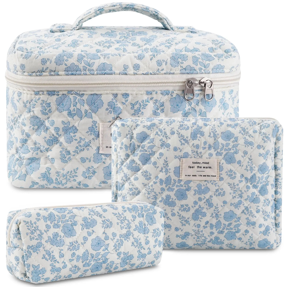A set of quilted cotton makeup organizers in light blue and white floral patterns.