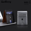 A black leather wallet with a blue money clip is shown next to a gray textured RFID protection wallet.