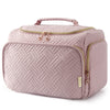 A light pink quilted cosmetic organizer bag with a zipper and handle.