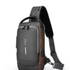 A gray and brown anti-theft crossbody chest bag shown from the side.