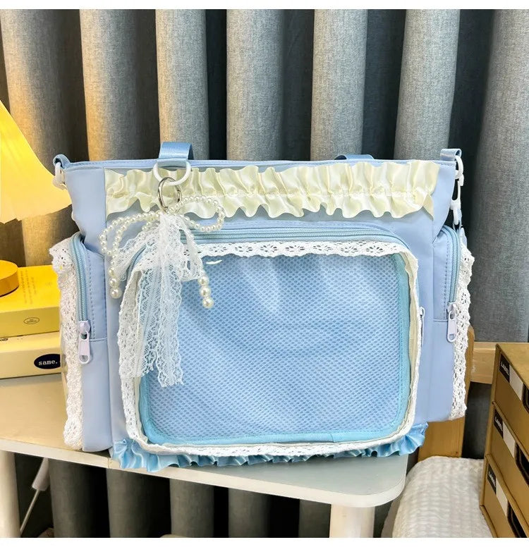 Bolso cruz de encaje azul claro Y2K con ribetes de volantes blancos y detalles de encaje transparente.