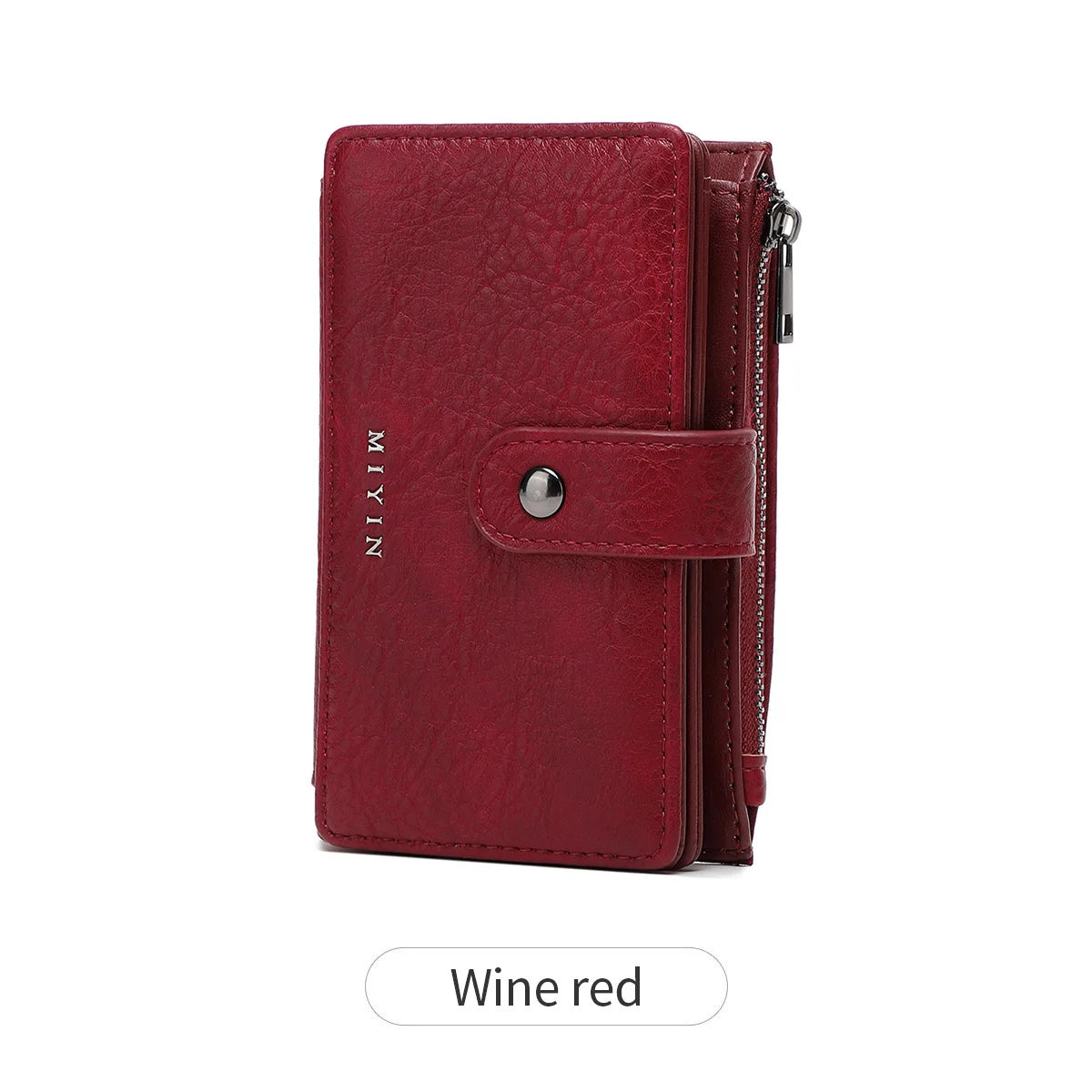 A maroon leather clutch wallet with a flap and zipper closure.
