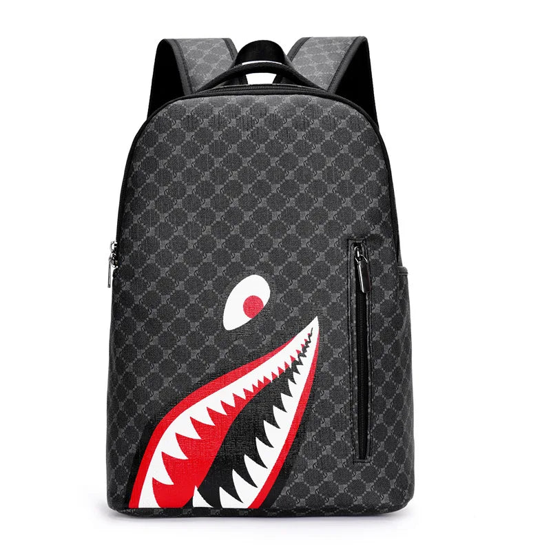 A black plaid laptop backpack featuring a red and white tiger tooth graphic.