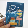 A blue passport cover featuring a 'I love to travel' design with silhouettes of cities like New York, London, Paris, and Amst
