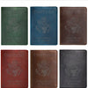 Six genuine leather passport holders in various shades of green, blue, brown, red, and gray featuring the United States seal.