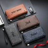 A collection of brown and black leather wallets and card holders arranged on a dark surface.