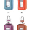 Four leather key cases in blue, orange, purple, and brown with transparent windows displayed side by side.