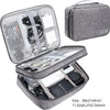 A gray portable digital organizer storage pouch with a zippered compartment and an open section showing various electronic ac