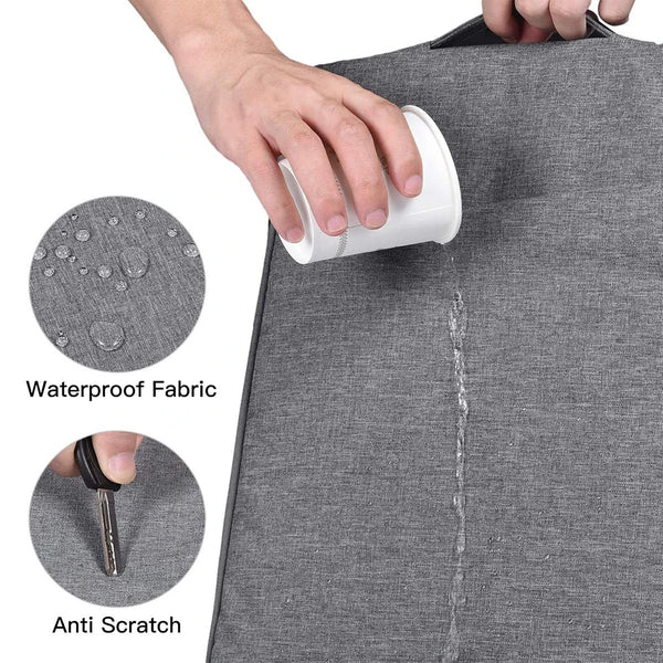 A hand is holding a white silicone sleeve for a laptop, demonstrating its waterproof fabric and anti-scratch features.