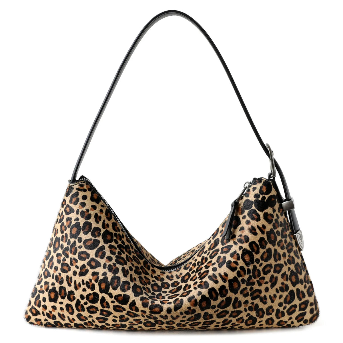A close-up of a brown and black leopard print vintage horsehair and cowhide crossbody bag.