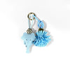 A set of blue floral PU leather keychain and bag charm featuring a elephant shape and a pom-pom tassel.
