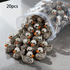 A pile of 20 gothic skull duck figurines in a clear plastic bag