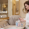 A woman organizes her toiletries in a waterproof PVC toiletry bag in a bathroom setting.