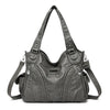 Dunkelgrabe Vintage-Soft-PU-Leder-Schultertasche mit Schnurverschluss und Lederriemen.