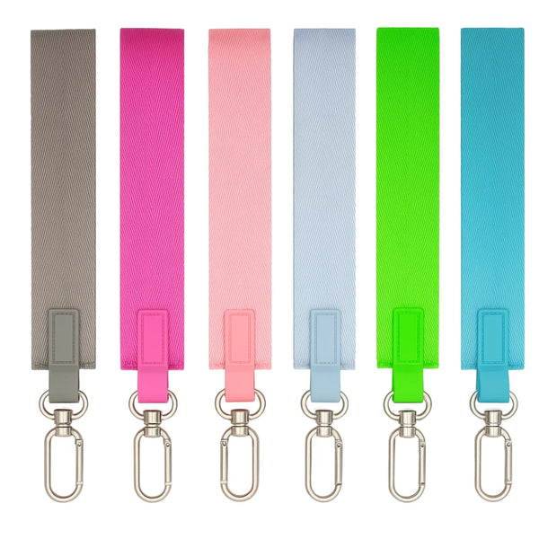 A set of five multicolor nylon wrist strap keychains in shades of gray, pink, blue, and green.